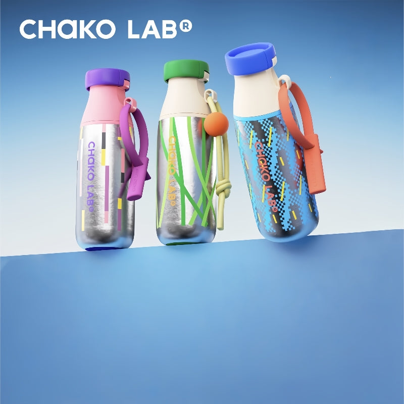 Chako Lab MilkMate Pure Titanium Water Bottle with dual lids on a table