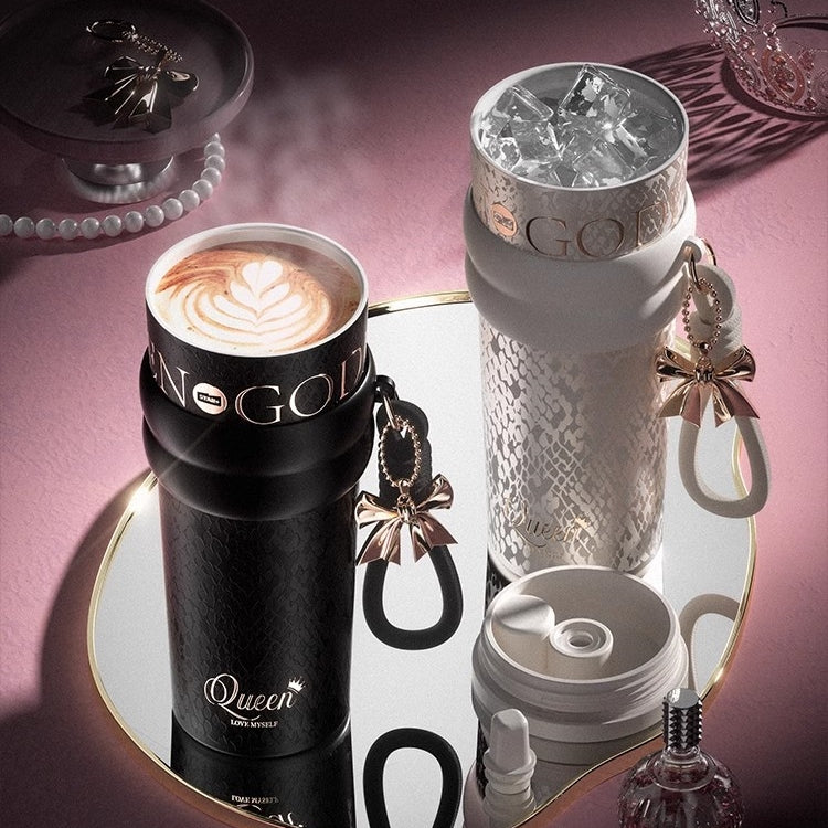 Stylish STAR+ Aurora Starry Night bottle in white with elegant bow charm