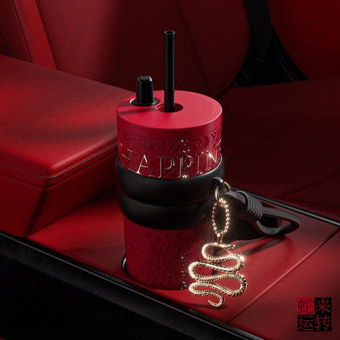 Eye-catching snake motif tumbler for 2025 celebration Eye-catching snake motif tumbler for 2025 celebration