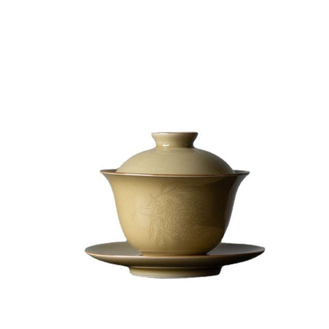Imitation Ding Kiln Yellow Gaiwan with Floral Engraving Imitation Ding Kiln Yellow Gaiwan with Floral Engraving