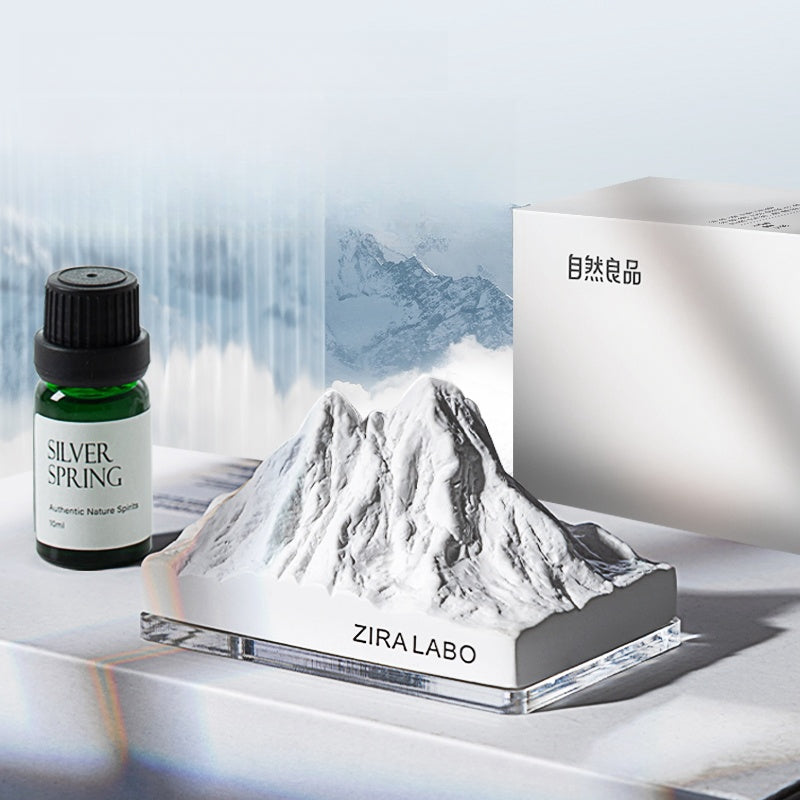 Mountain-inspired aroma diffuser with essential oils