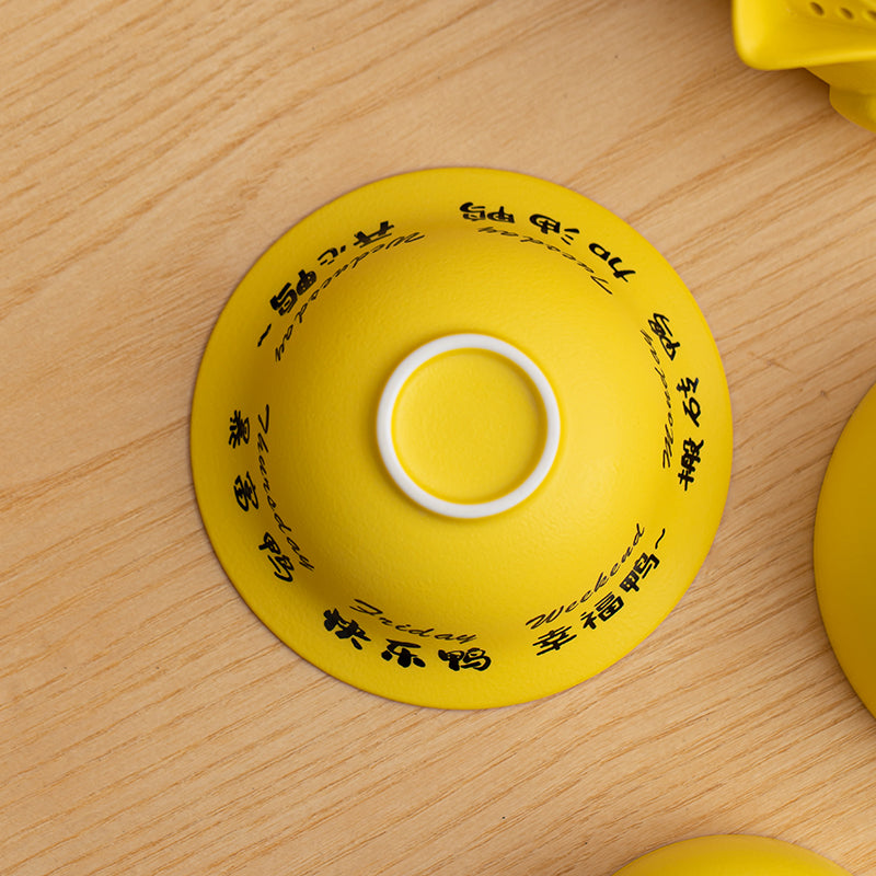 JIA YOU YA ceramic travel tea set with rotating duck lid and portable storage bag.