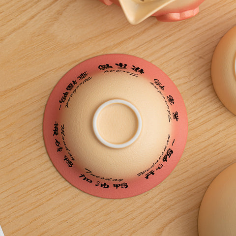 JIA YOU YA ceramic travel tea set with rotating duck lid and portable storage bag.
