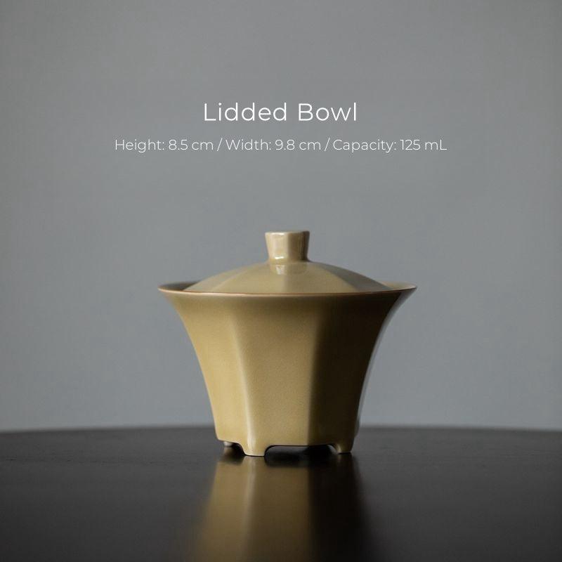 Imitation Ding Kiln Yellow Eight-Sided Lidded Bowl